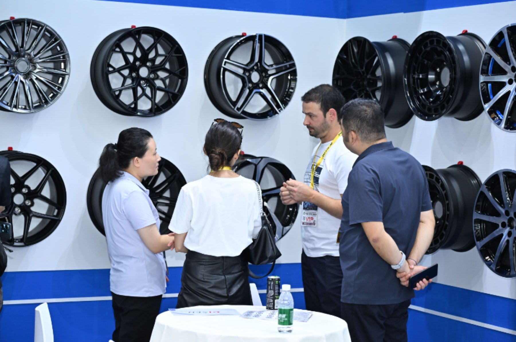 Buyer meeting at a forged wheel display wall