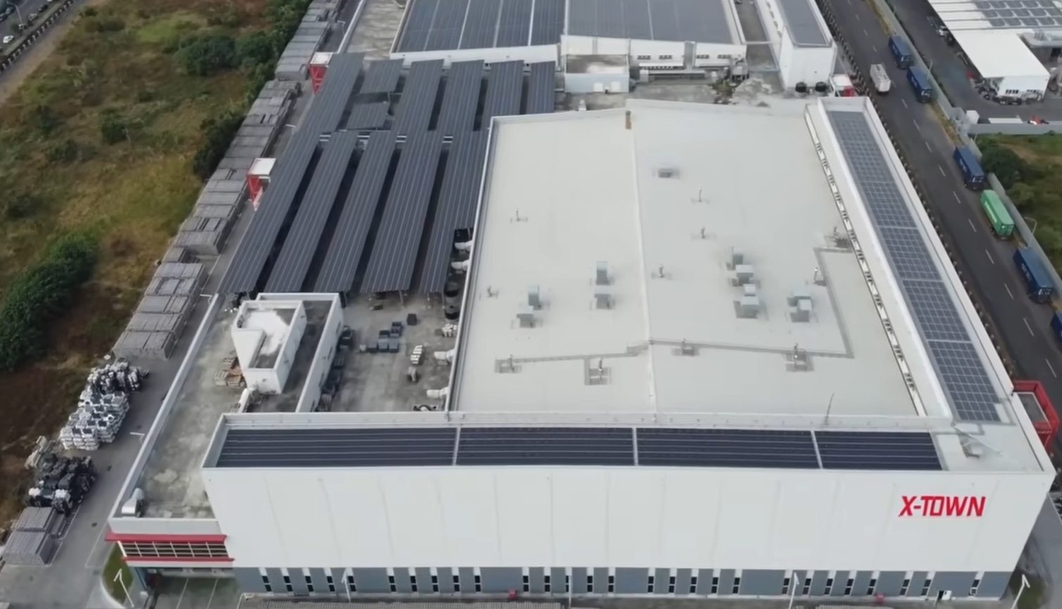 XBORUL factory aerial — branded plant with rooftop solar