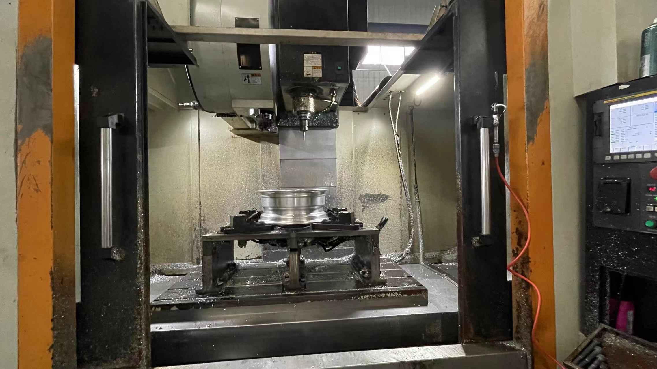 Wheel in a machining center for hole work